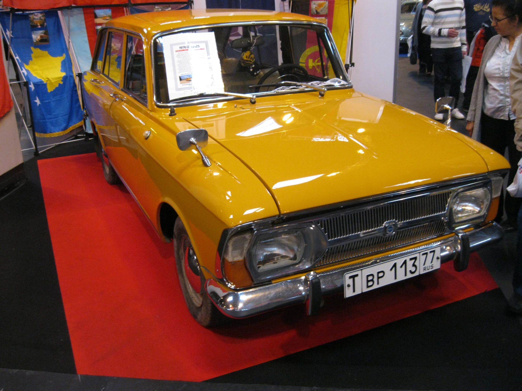 old, shiny and restored ford escort in a car museum