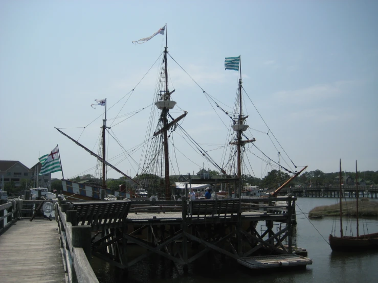 a ship at dock on a partly cloudy day