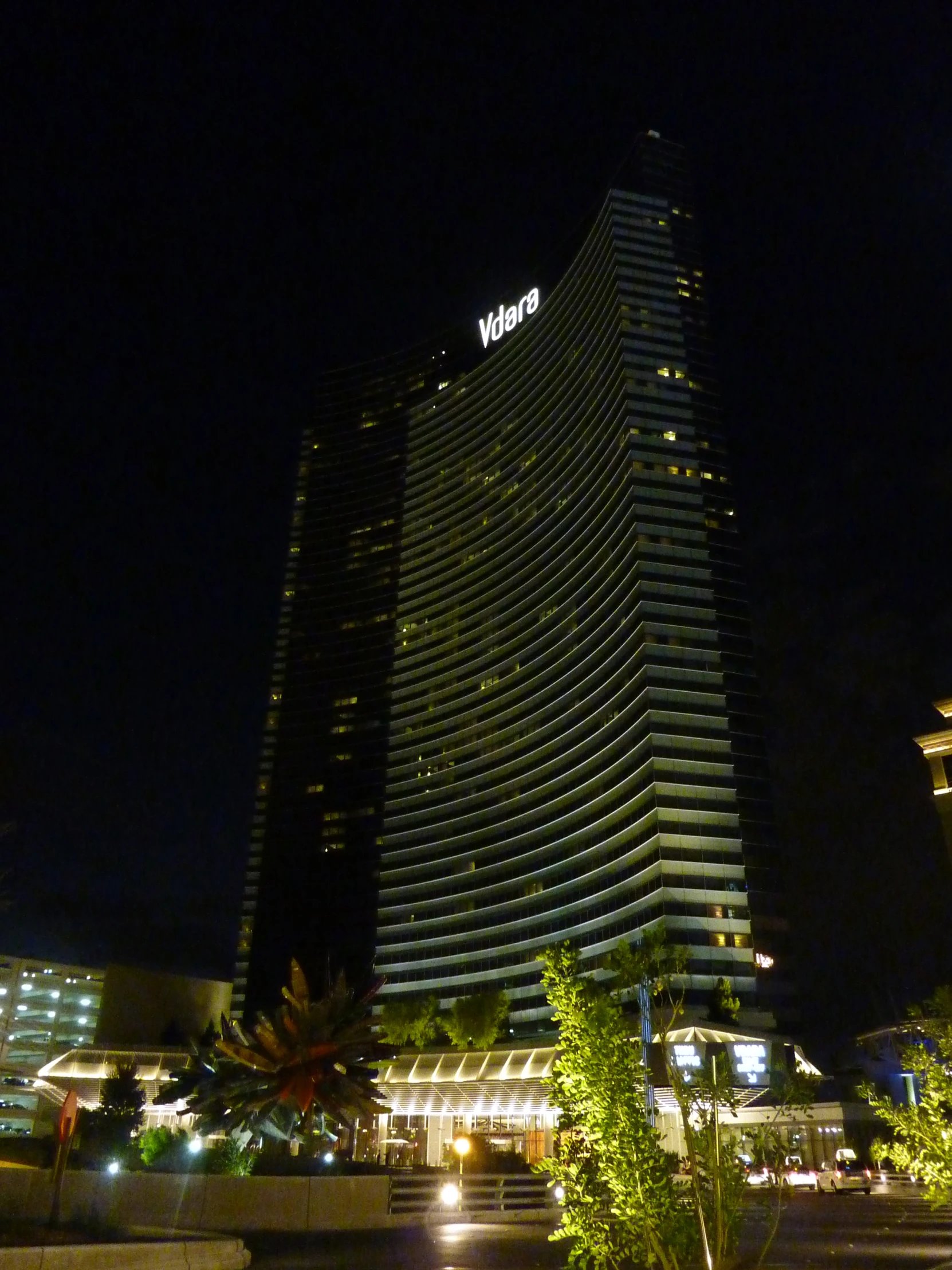 a large building is at night and lit up with lights