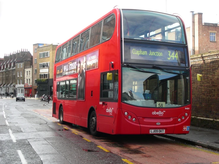 a double decker bus that is on the street