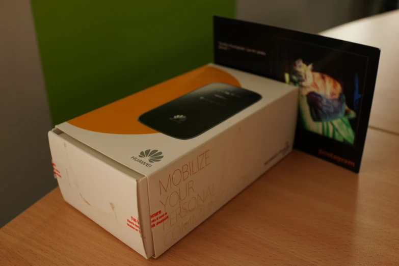 a phone sits in a box with a box inside