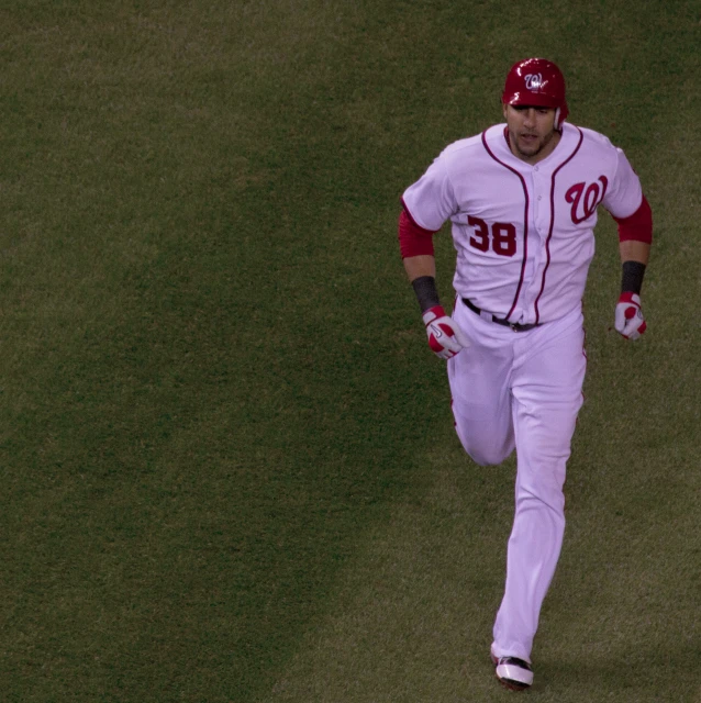 a professional baseball player running on a field