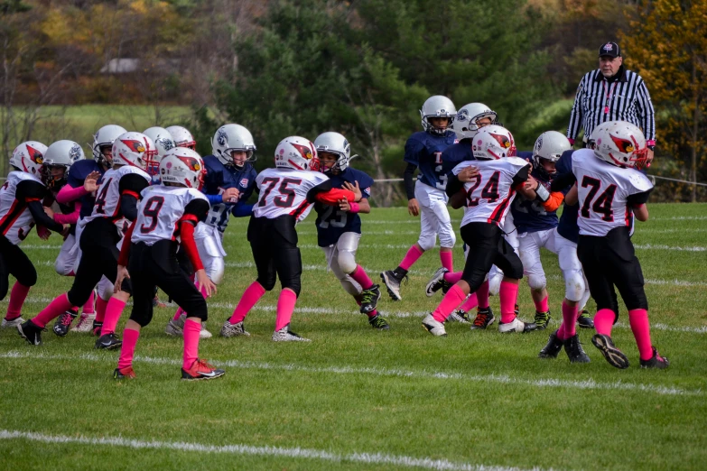 a group of football players playing a game