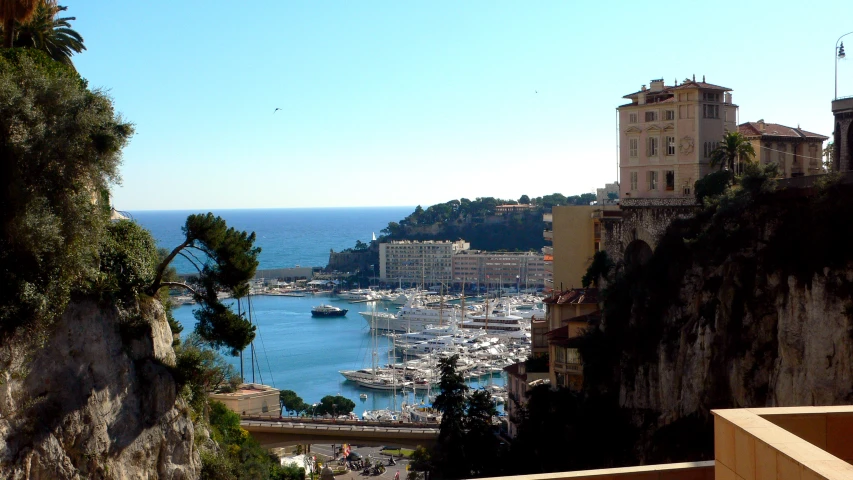 a boat dock and harbor at a mediterranean city