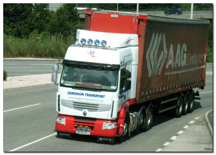 a semi - truck on the road in the united kingdom
