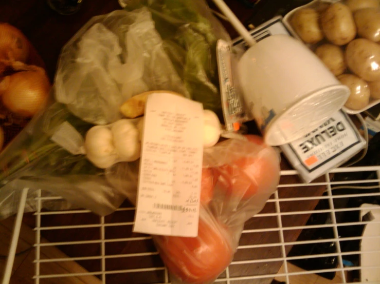 a variety of food sitting on top of a shelf