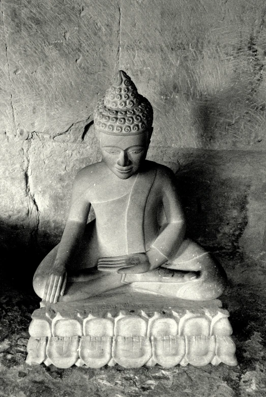 an image of buddha statue in black and white