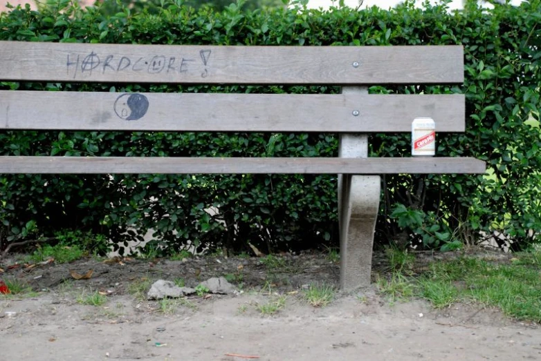 a park bench that has writing on it