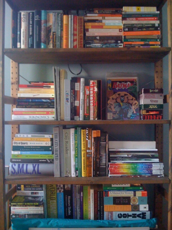 a book shelf is filled with books in this picture