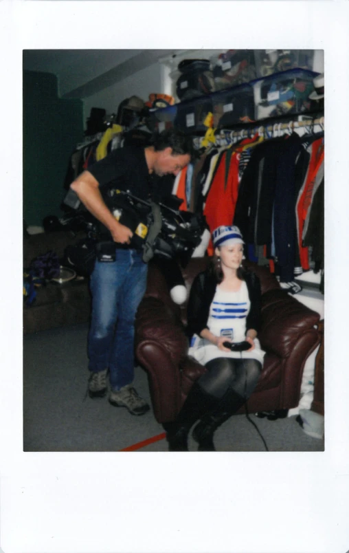 a police officer with a fake child on a chair