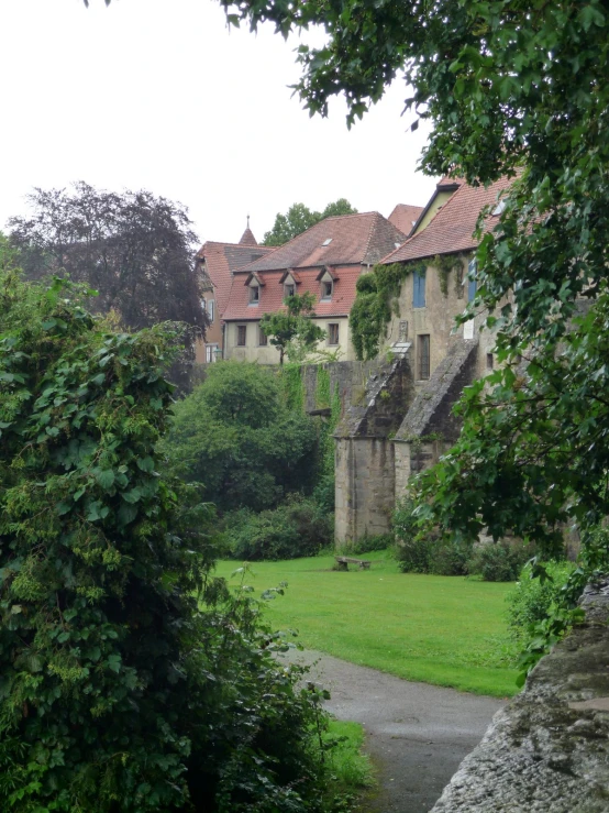 a large house that is surrounded by trees