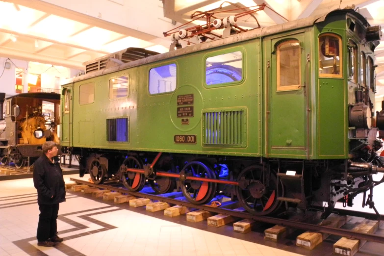 a large train on display in a museum