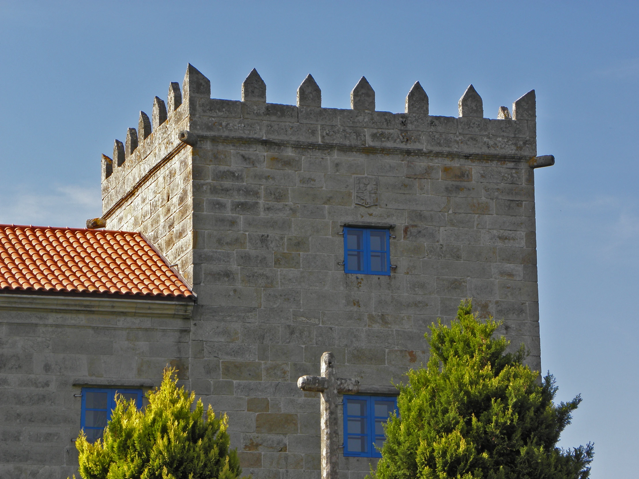 the tower of an old building with a sky background