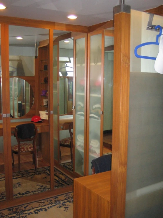 the interior of a wood and glass office