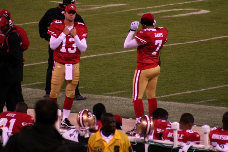 a football team standing on the field during a game