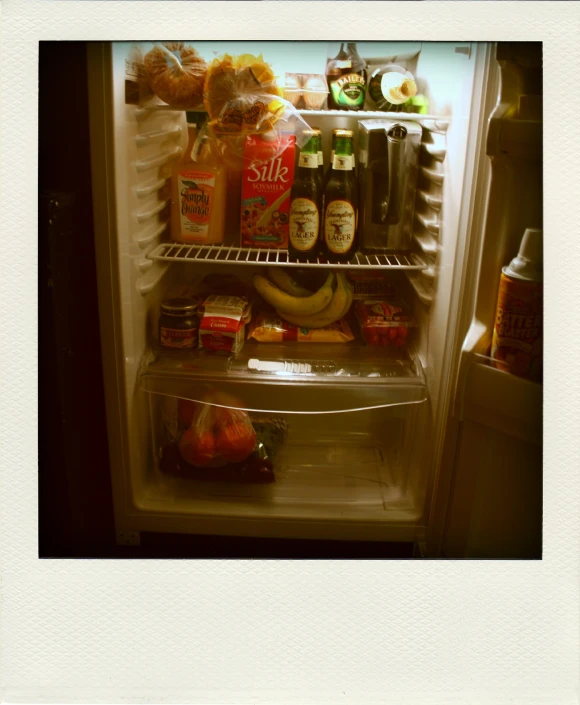 a fridge filled with lots of food and condiments