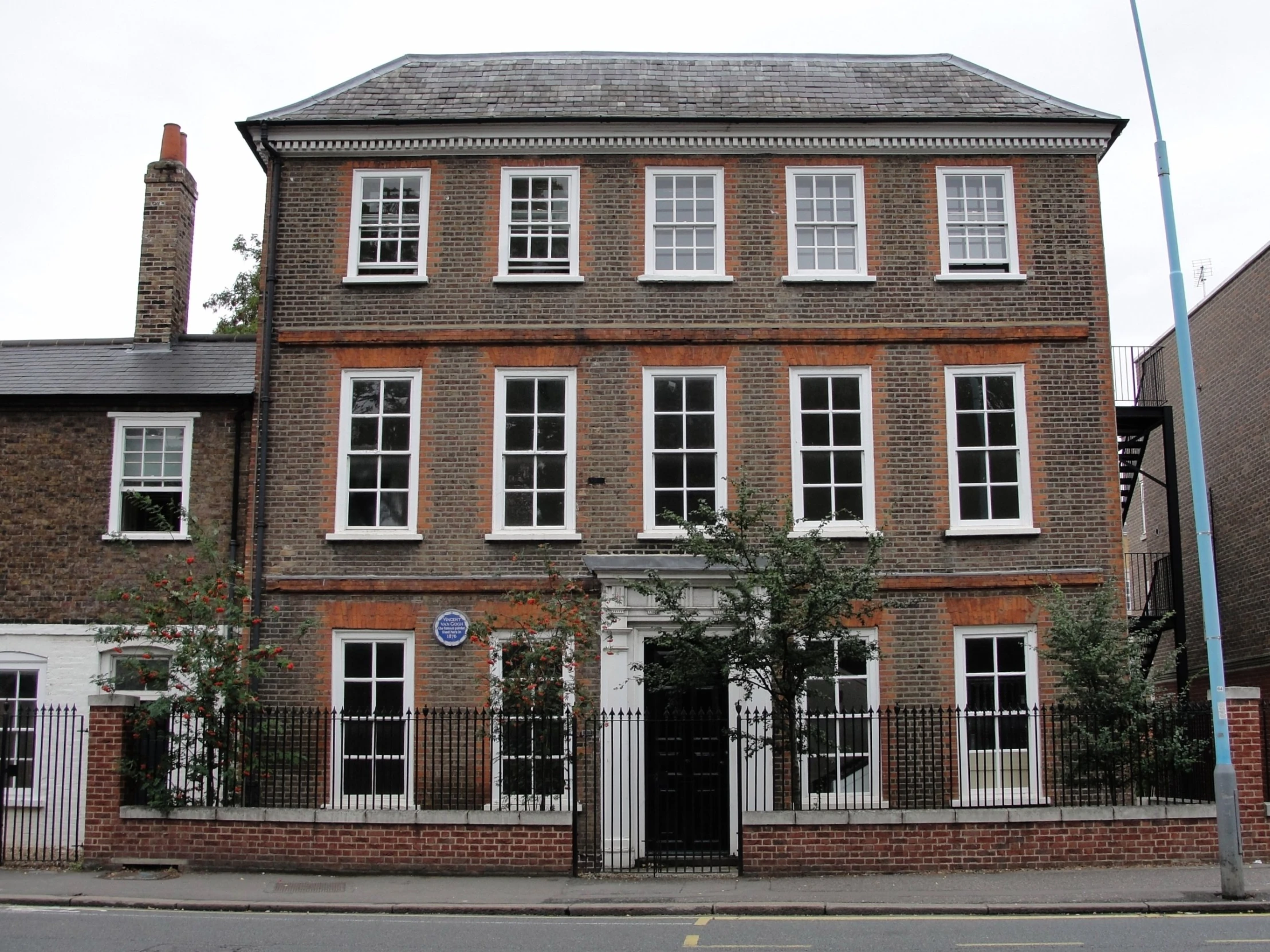 this is an old building with windows on the roof