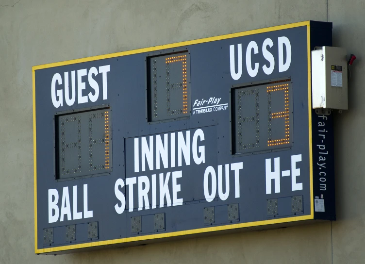 a sign for a baseball stadium that says guest inning strike out he hit