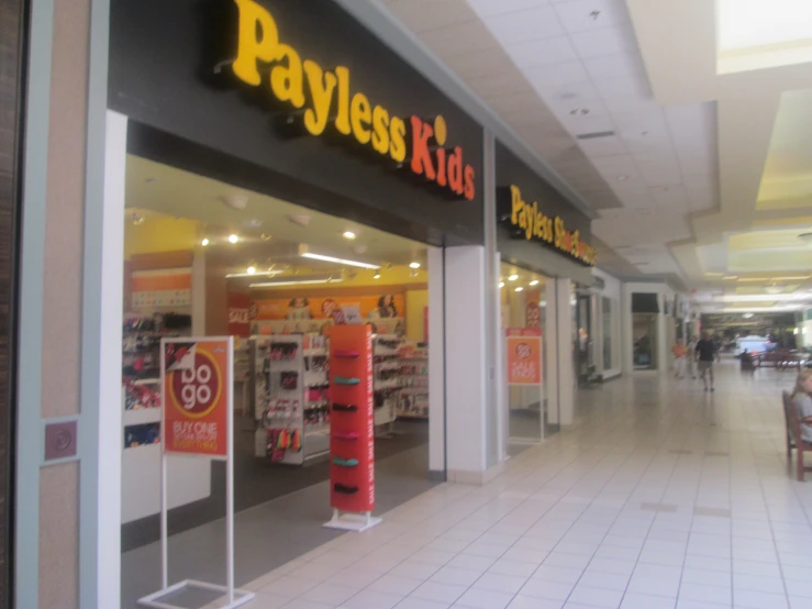 the interior of a store displaying its payless s products