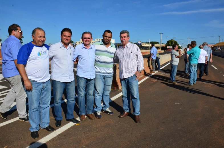 men standing in the street wearing polo shirts