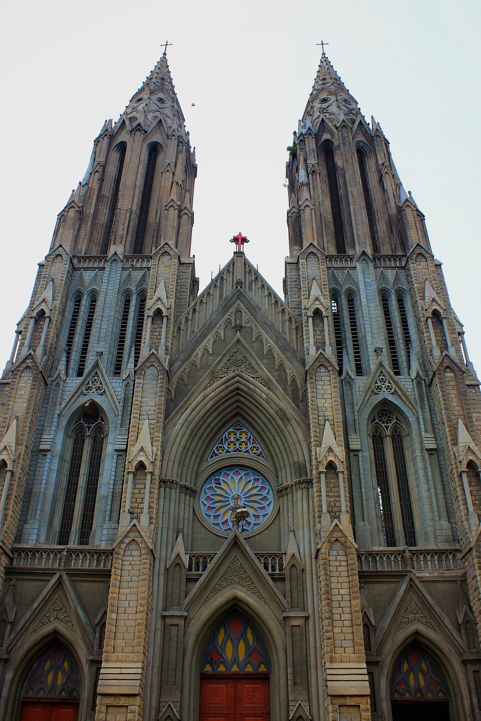 two large ornate church spires sitting next to each other