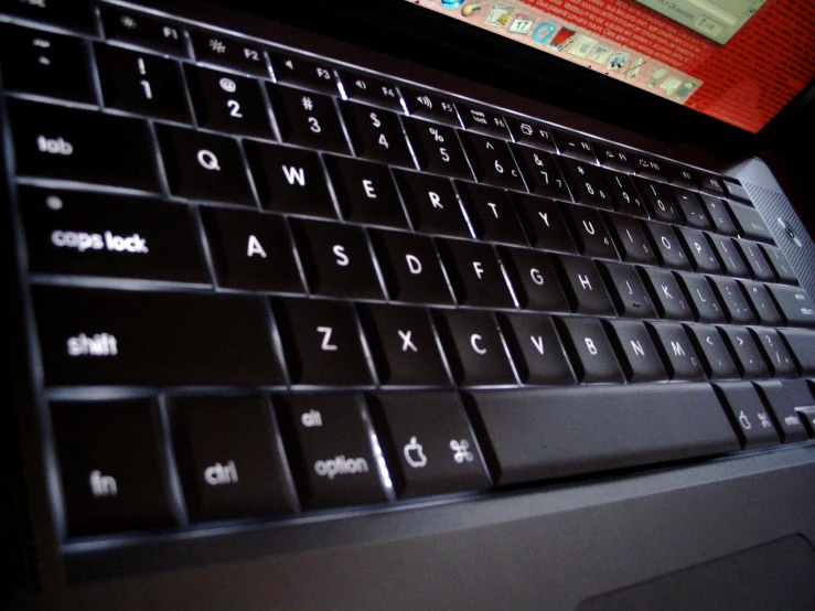 the backlit key of a black keyboard