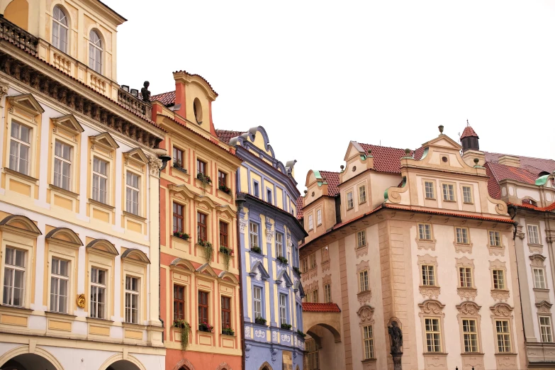 a line of buildings lined up on the street