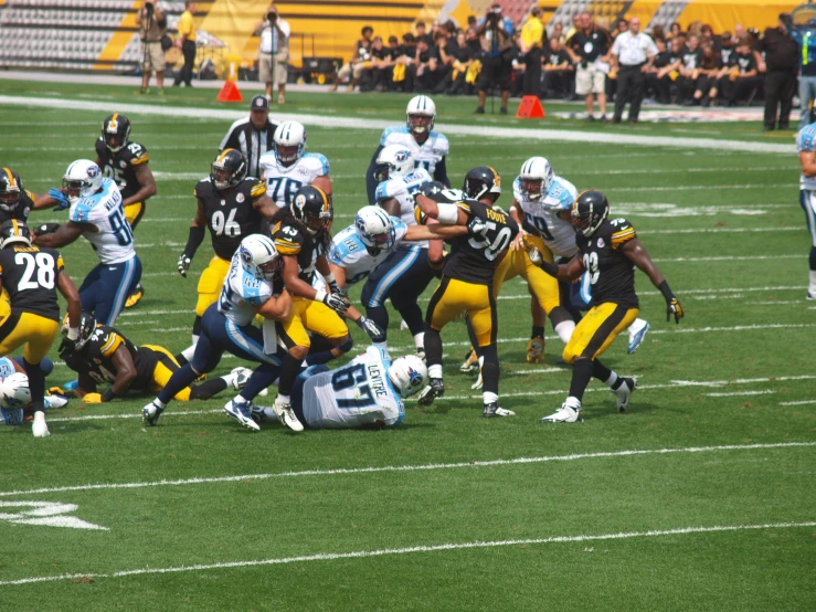 a team of football players on the field together