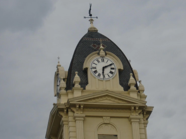 an image of a clock tower in the air