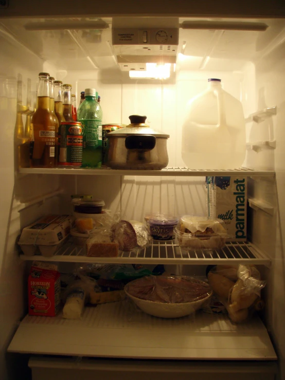 an open fridge showing the contents and contents inside