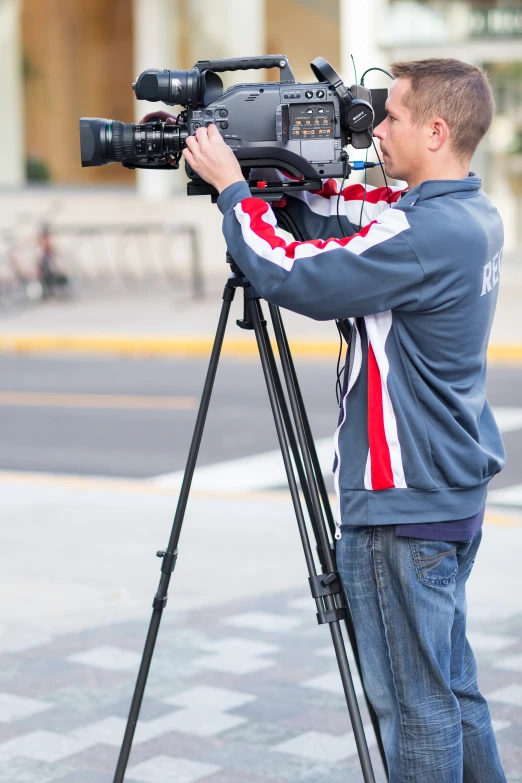 a person stands in front of a camera and is taking a picture