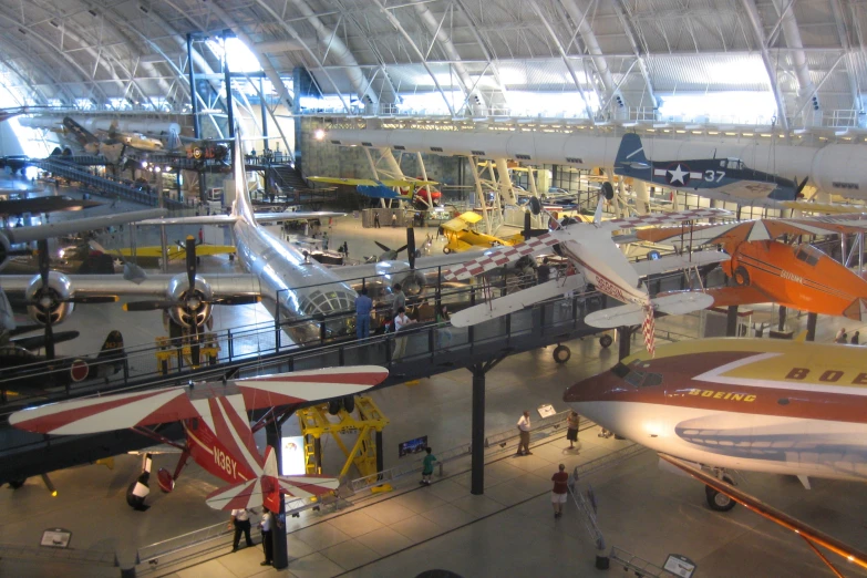 an air museum with many different sized planes on display