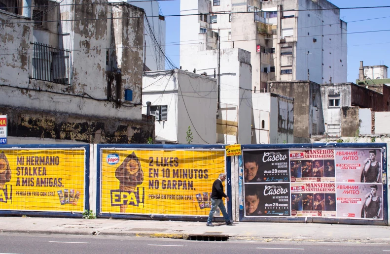 an image of billboards and advertits on the side of the street