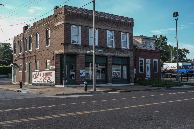 a store sitting on the side of the road with no parking