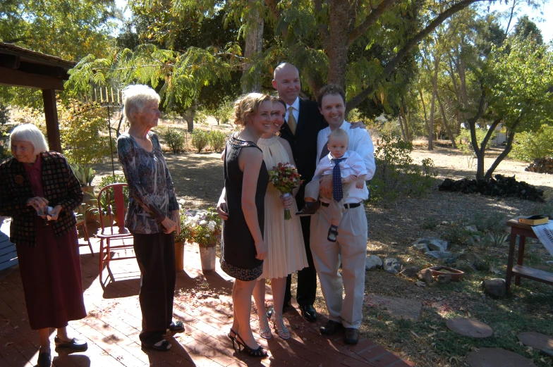 a family is posing for a group po