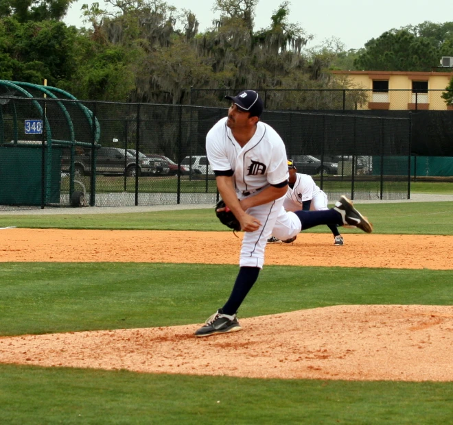 a pitcher winding up to throw the ball