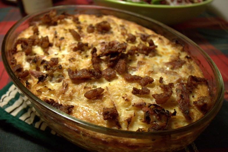 the casserole has meat and cheese on it