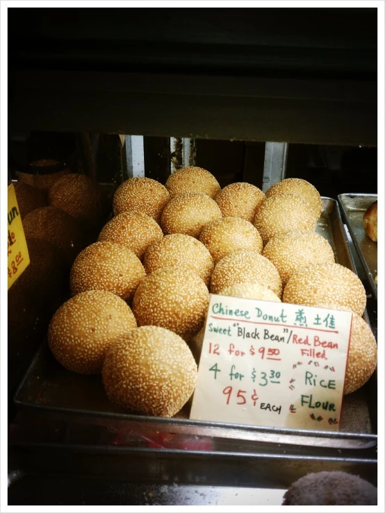 a pile of different types of food sitting on display in a store