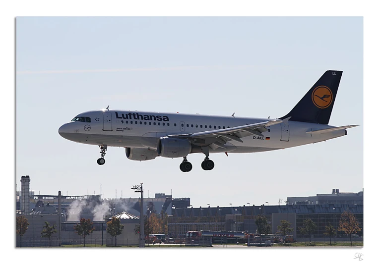 a lufthansa airplane taking off on a clear day
