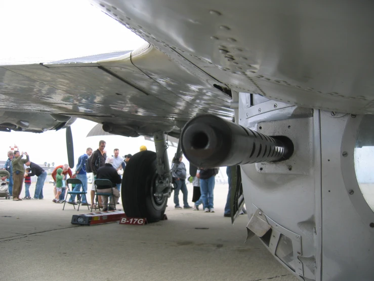 there is a tire sitting in front of an airplane