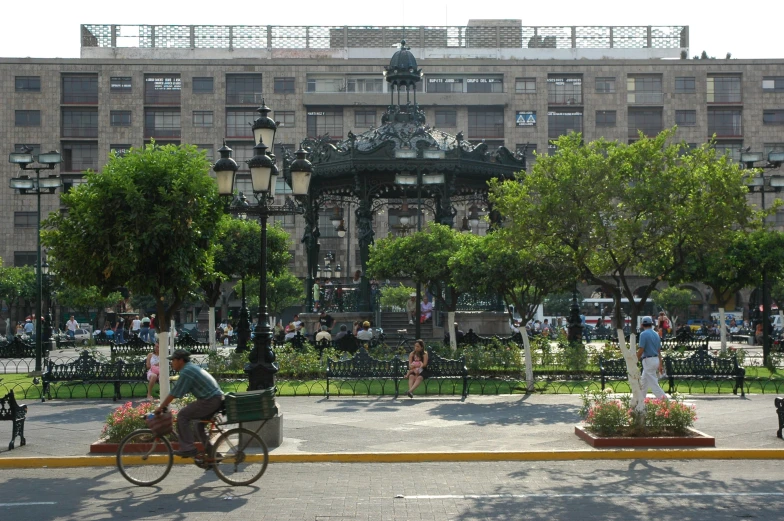 a group of people on bikes and people riding by