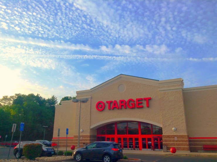 an exterior view of a target store with cars parked outside