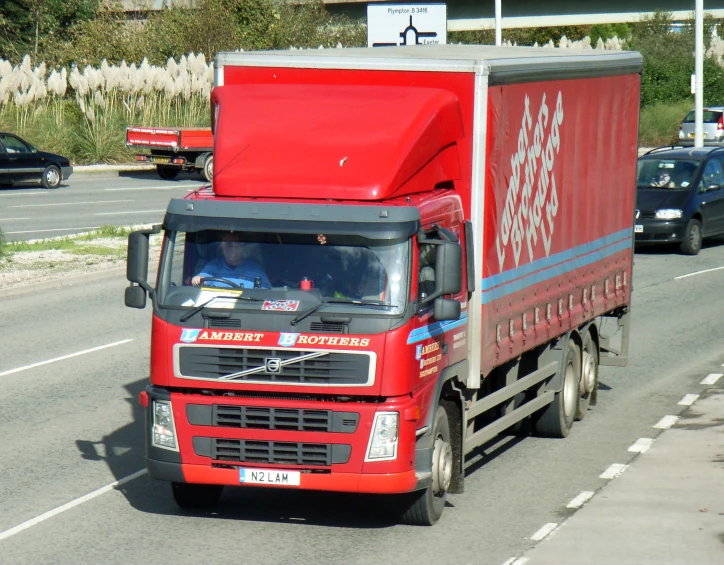 an image of a truck driving down the road