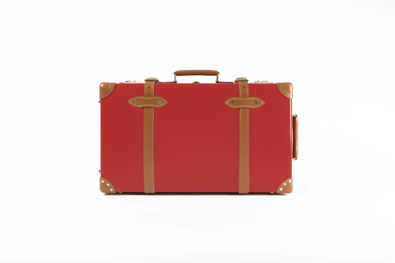 red suit case with tan handles, white background