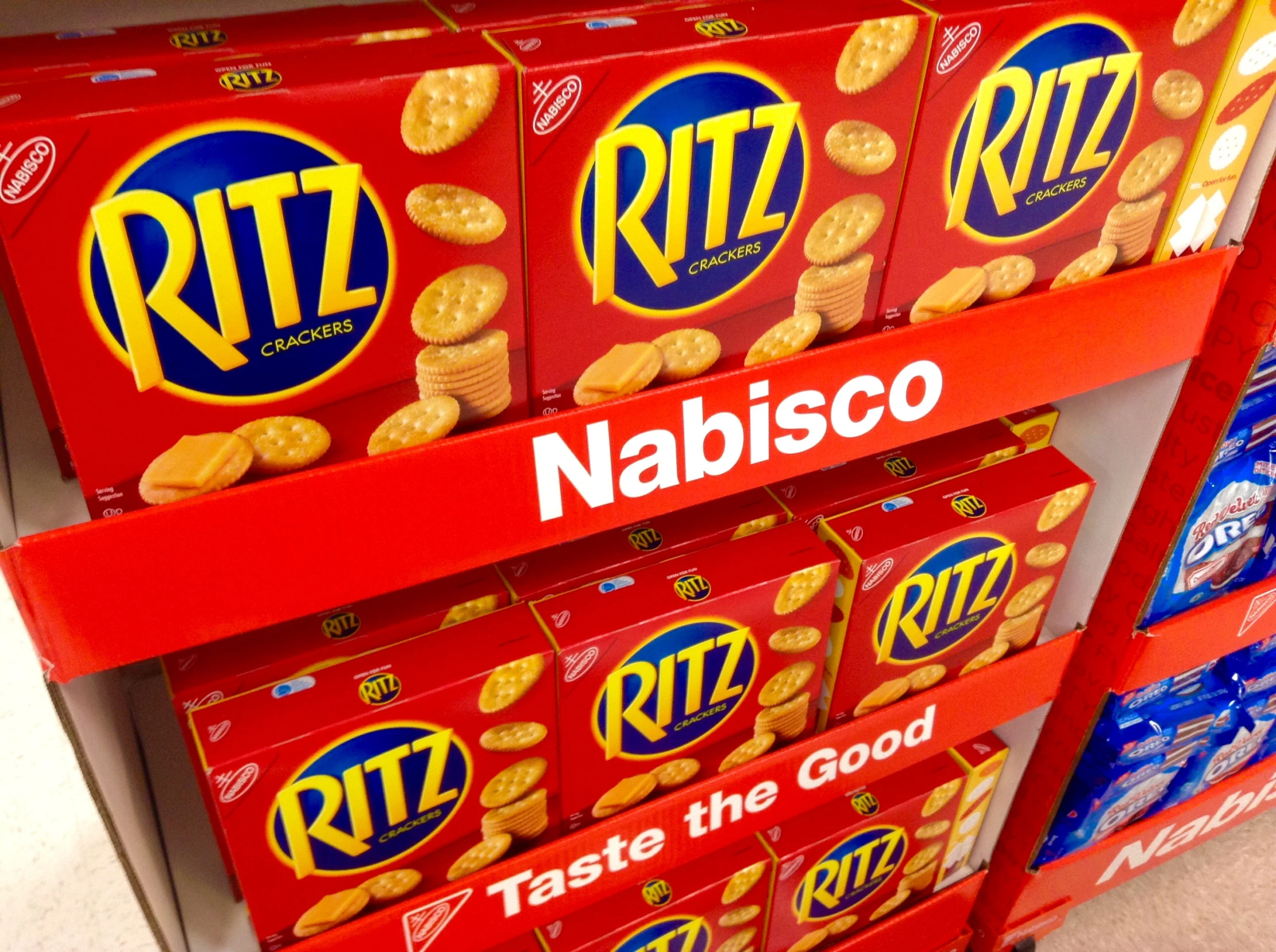 rows of snacks for sale on a store shelf