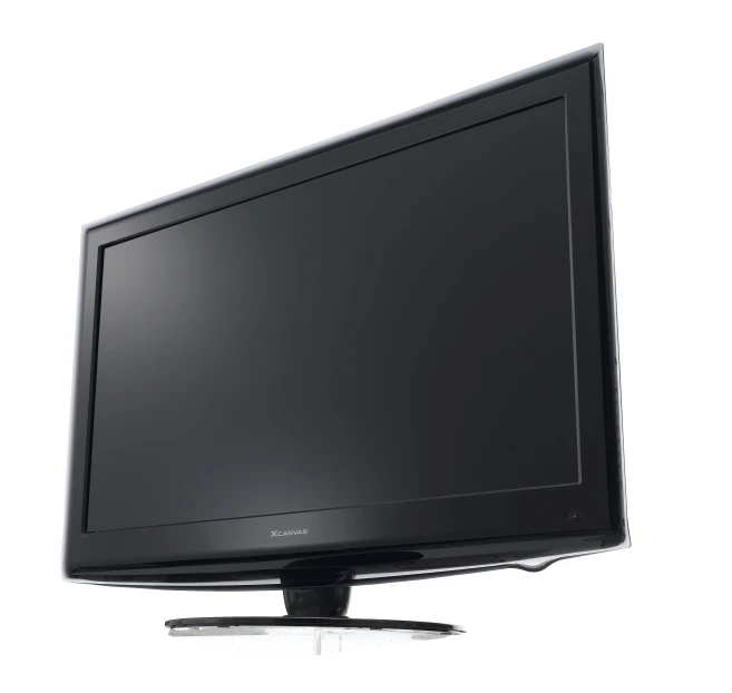a flat screen television sitting in front of a white wall