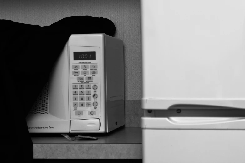 a close up view of a microwave and toaster oven