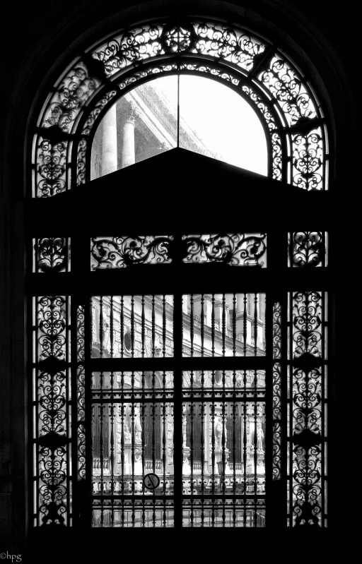 an old window and barred iron bars of an old building