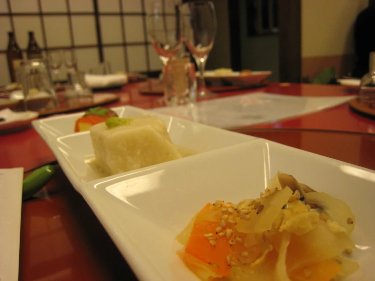 a plate with some type of gourmet item sitting on a table