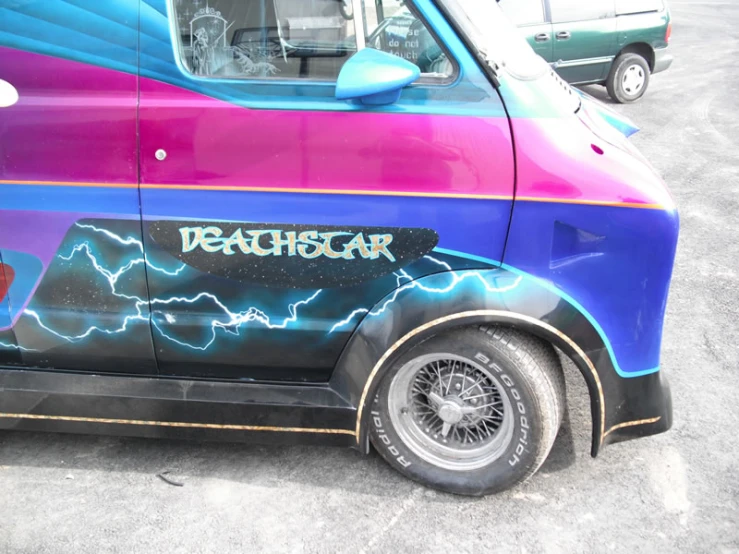 a van with an image of a lightning storm painted on the side